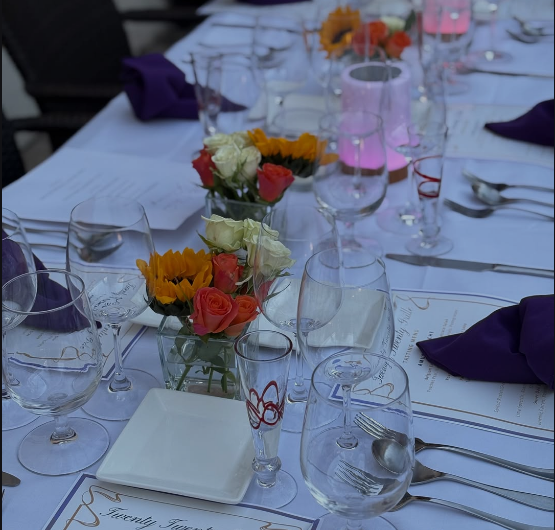 Floral table setting and place settings for a restaurant event